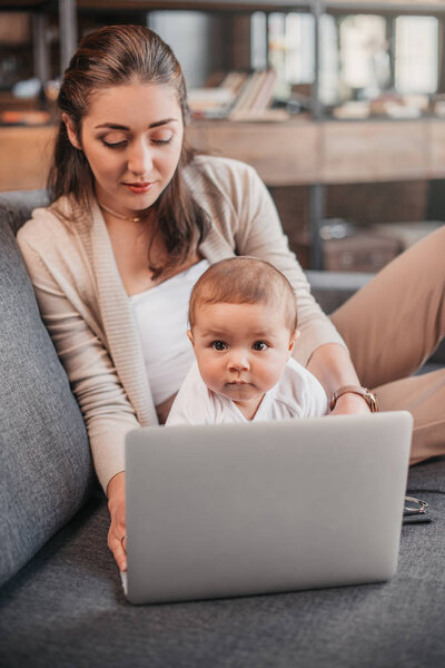 family using laptop