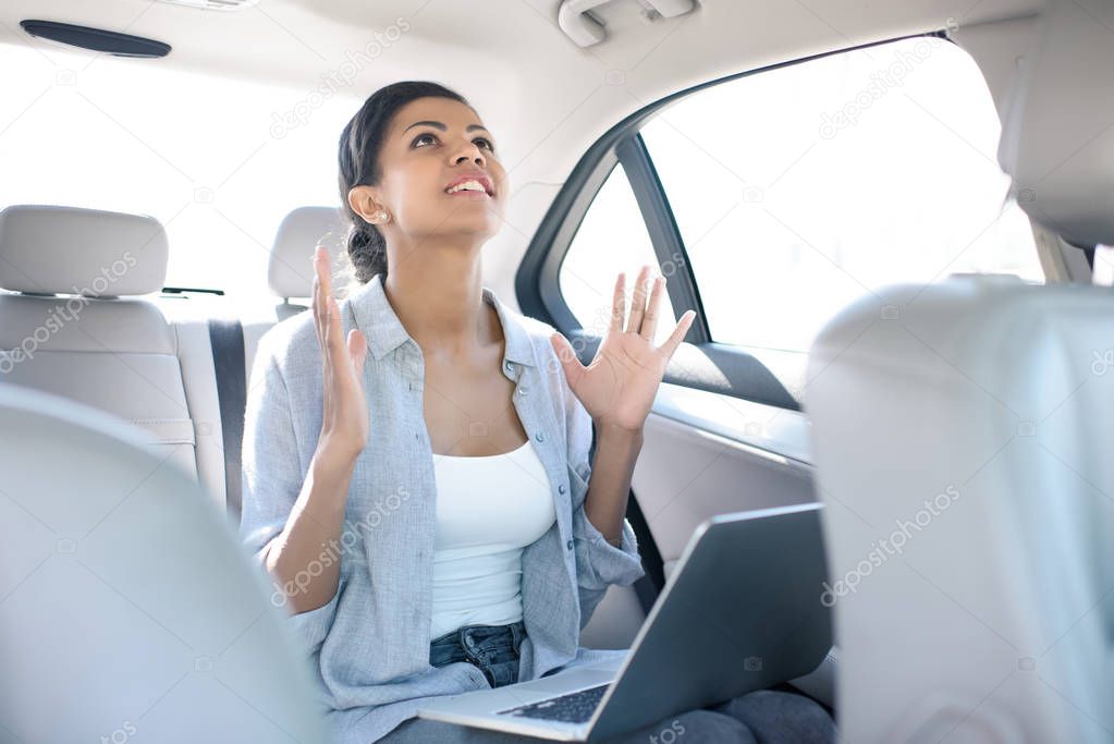 african american woman in taxi 