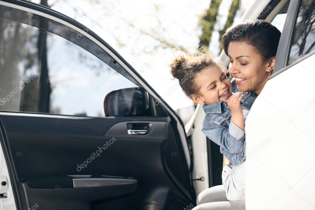 mother and daughter in car