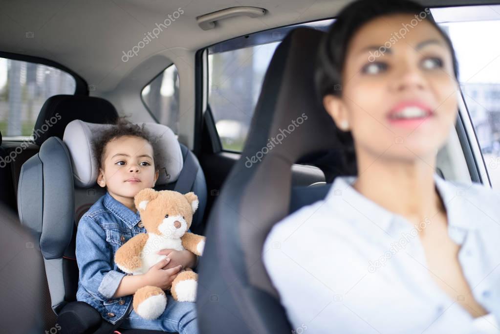 mother and daughter in car