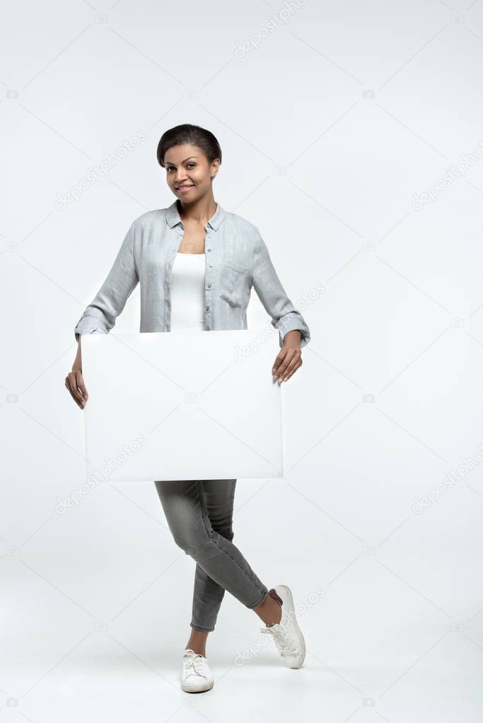 woman holding empty banner