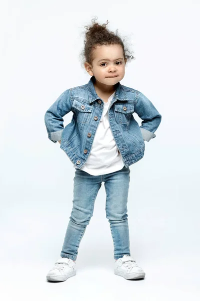 Funny little kid girl in jeans — Stock Photo, Image