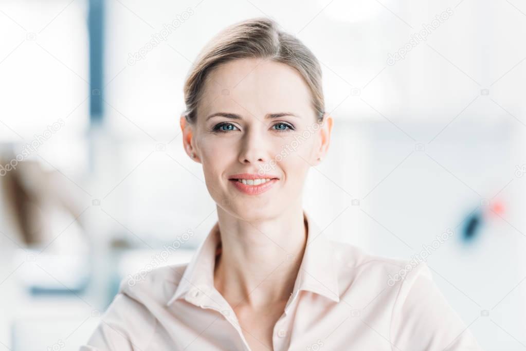 young smiling caucasian businesswoman