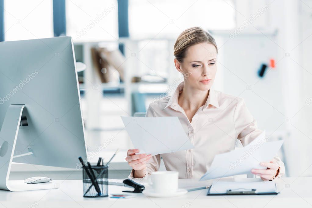 businesswoman working with documents at office