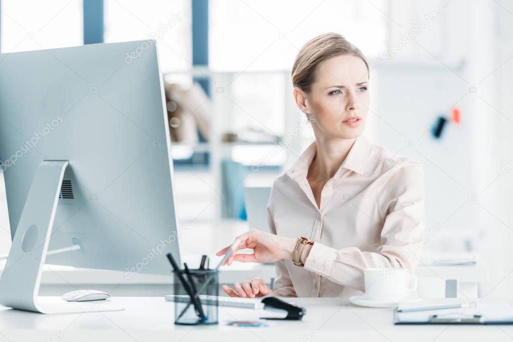 businesswoman working on computer at office