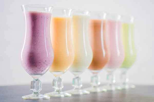 Delicious milkshakes in glasses 