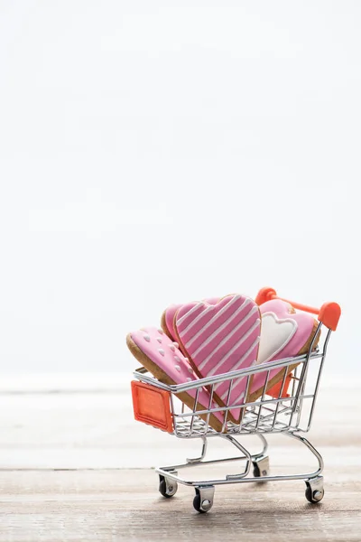 Shopping vagn full av cookies — Stockfoto