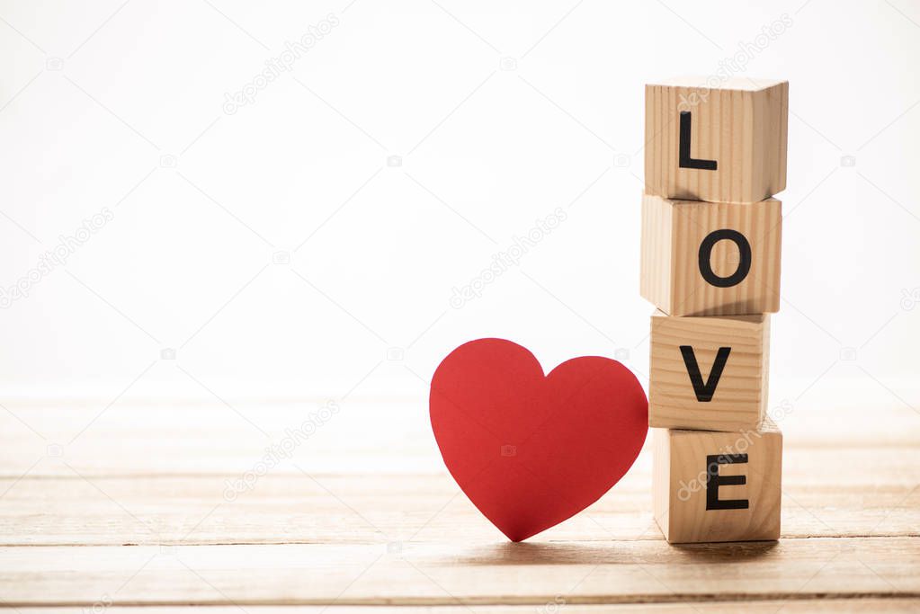 Heart with love sign on wooden cubes