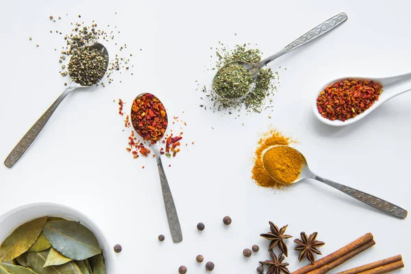 Various spices in spoons — Stock Photo, Image