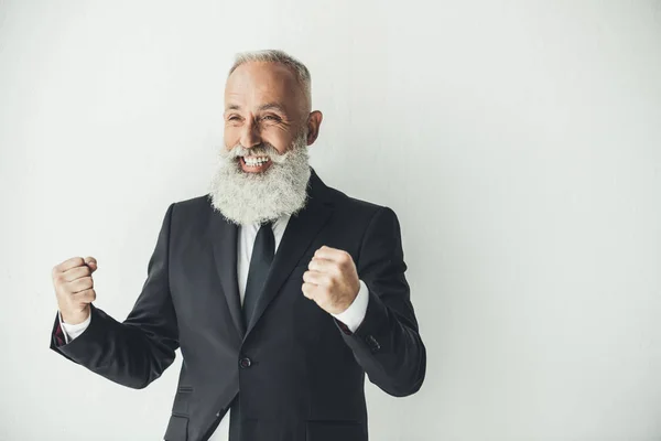 Senior businessman celebrating victory — Stock Photo, Image