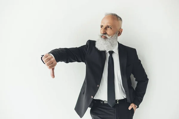 Geschäftsmann zeigt Daumen nach unten — Stockfoto