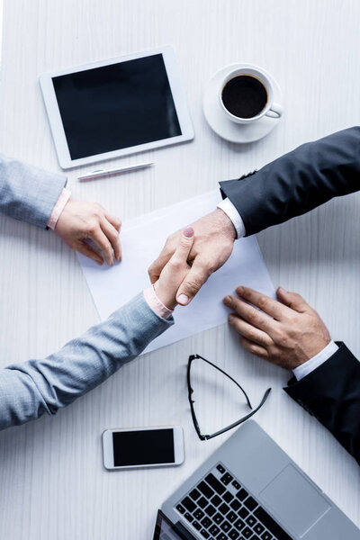 business people shaking hands