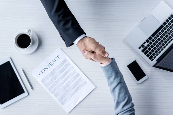 business people shaking hands