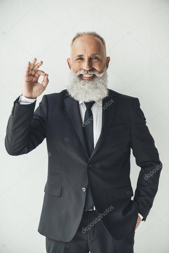 businessman showing okay sign