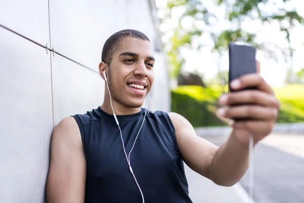 African american man with smartphone — Stock Photo, Image