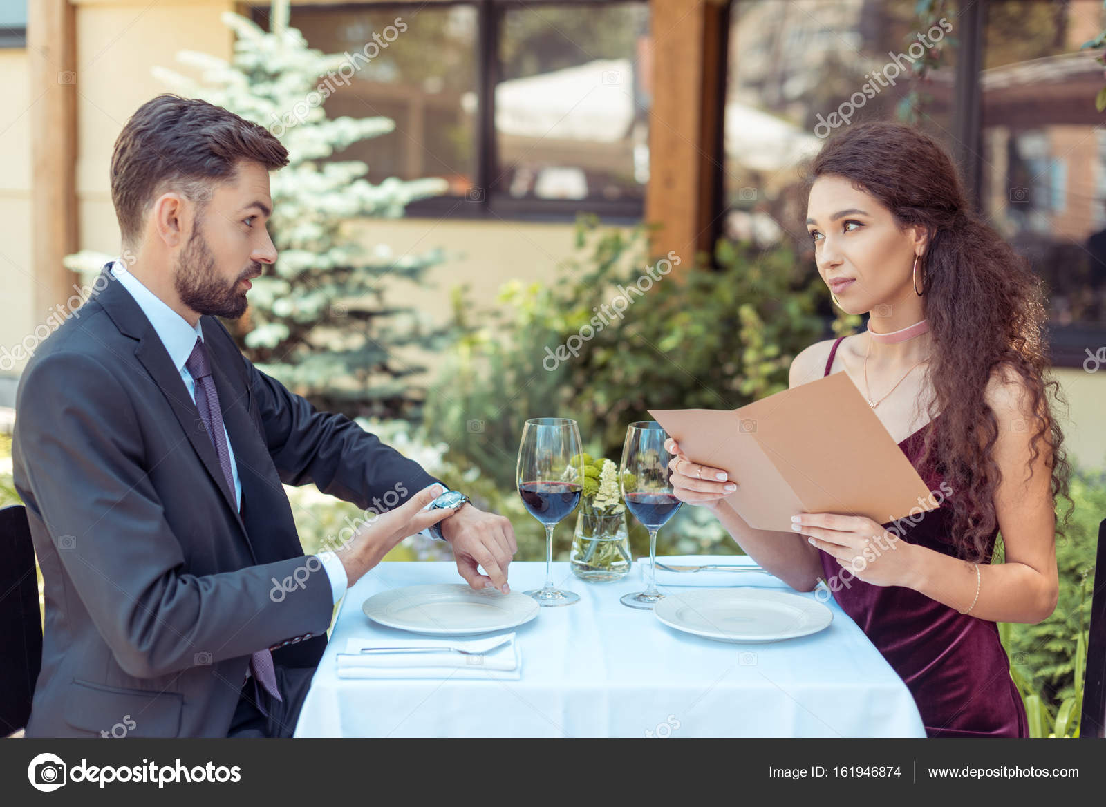 Romantic Date In Restaurant Stock Photo IgorTishenko 161946874 romantic-date-in-restaurant-stock-photo-igortishenko-161946874