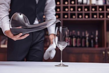 sommelier pouring red wine clipart