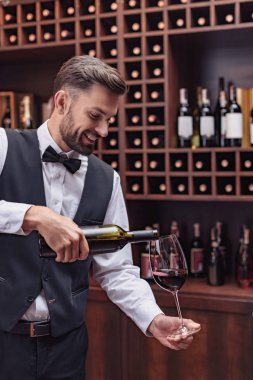 sommelier pouring red wine clipart