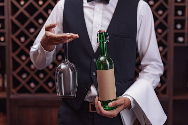 sommelier with wine and glass