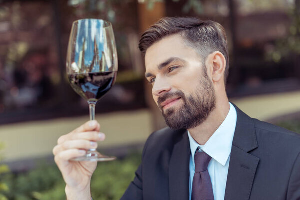 sommelier tasting wine