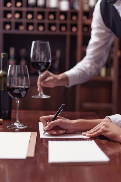 Sommeliers tasting wine in cellar — Stock Photo, Image