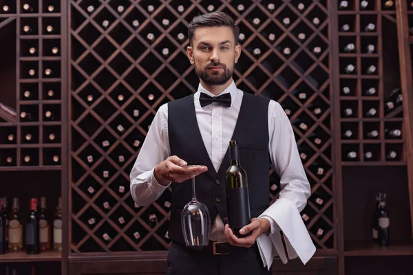 Sommelier with wine and glass — Stock Photo, Image