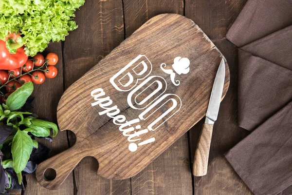 Vegetables with cutting board — Stock Photo, Image