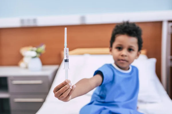 African american boy with syringe — Stock Photo, Image