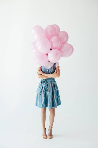 woman and pink balloons
