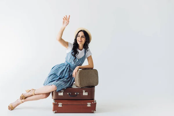 Woman waving to someone — Stock Photo, Image