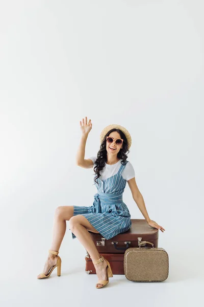 Woman waving to someone — Stock Photo, Image