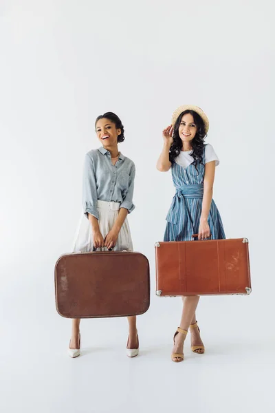 Multiethnic women with luggage — Stock Photo, Image