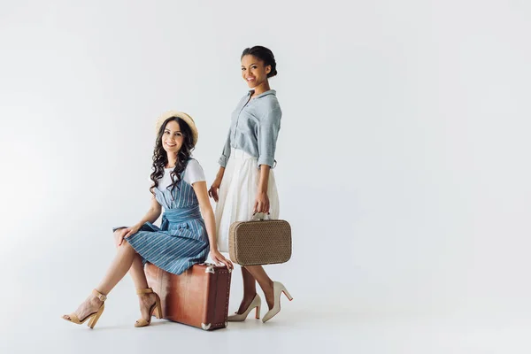 Multiethnic women with luggage — Stock Photo, Image