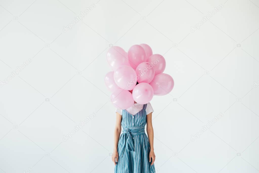 woman and pink balloons