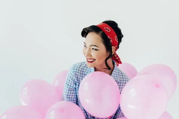 Asian woman with balloons — Stock Photo, Image