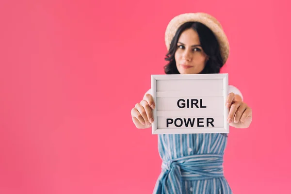 Woman with girl power board in hands — Stock Photo, Image