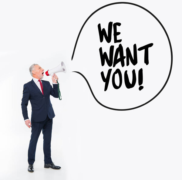 Бизнесмен кричит в громкоговорителе 