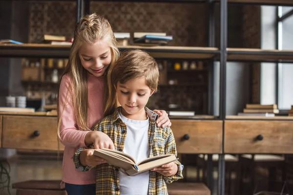 Adorable kids with book — Stock Photo, Image