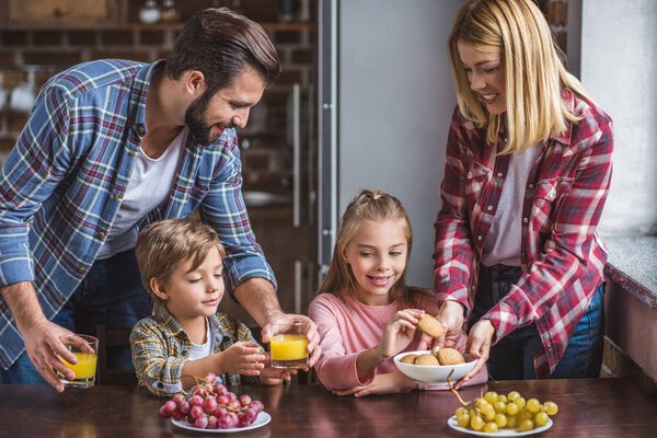 family having breakfast at home