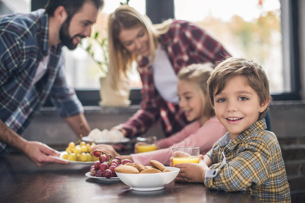 family having breakfast at home