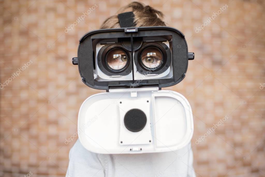 kid in virtual reality headset