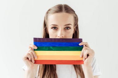 woman covering mouth with rainbow flag  clipart