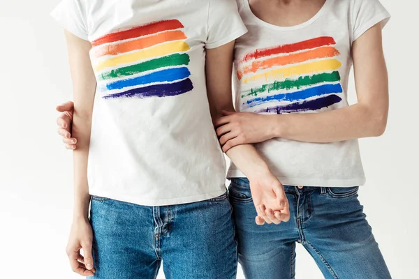 Women in white shirts with printed rainbow — Stock Photo, Image