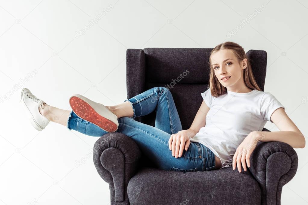 Girl on armchair