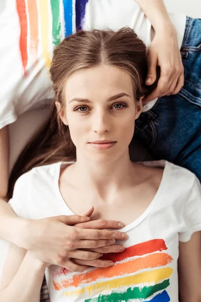 Woman lying on girlfriends belly — Stock Photo, Image