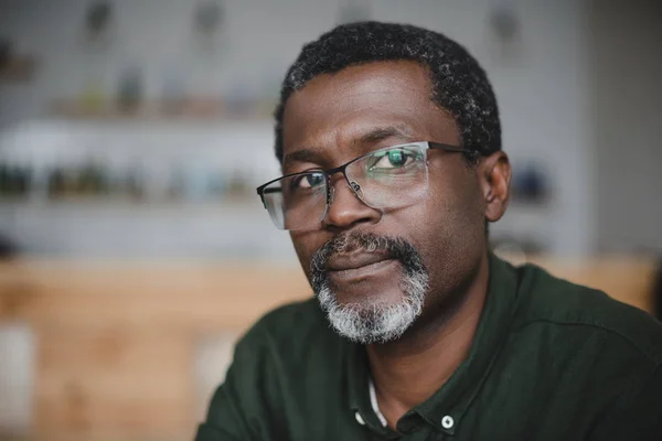 Mature african american man in bar — Stock Photo, Image