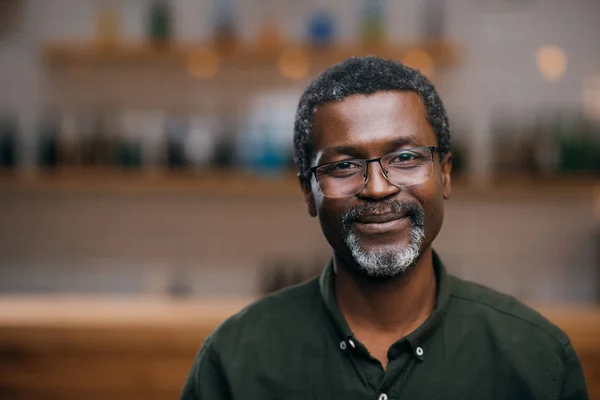 Mature man in bar — Stock Photo, Image