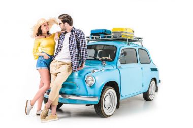 couple standing by car clipart