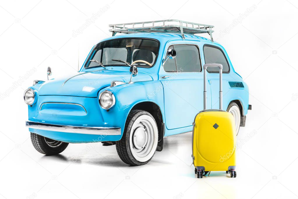 blue retro car with luggage