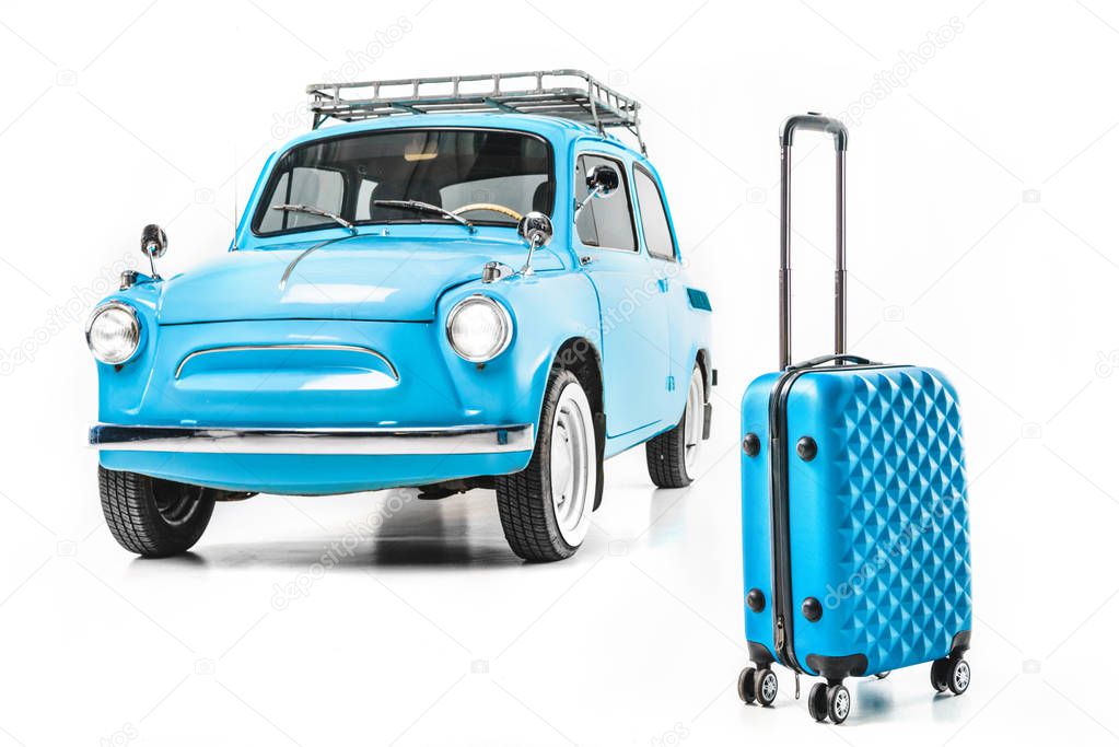blue retro car with luggage